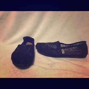 Size 7.5 black crochet Toms slip-ons